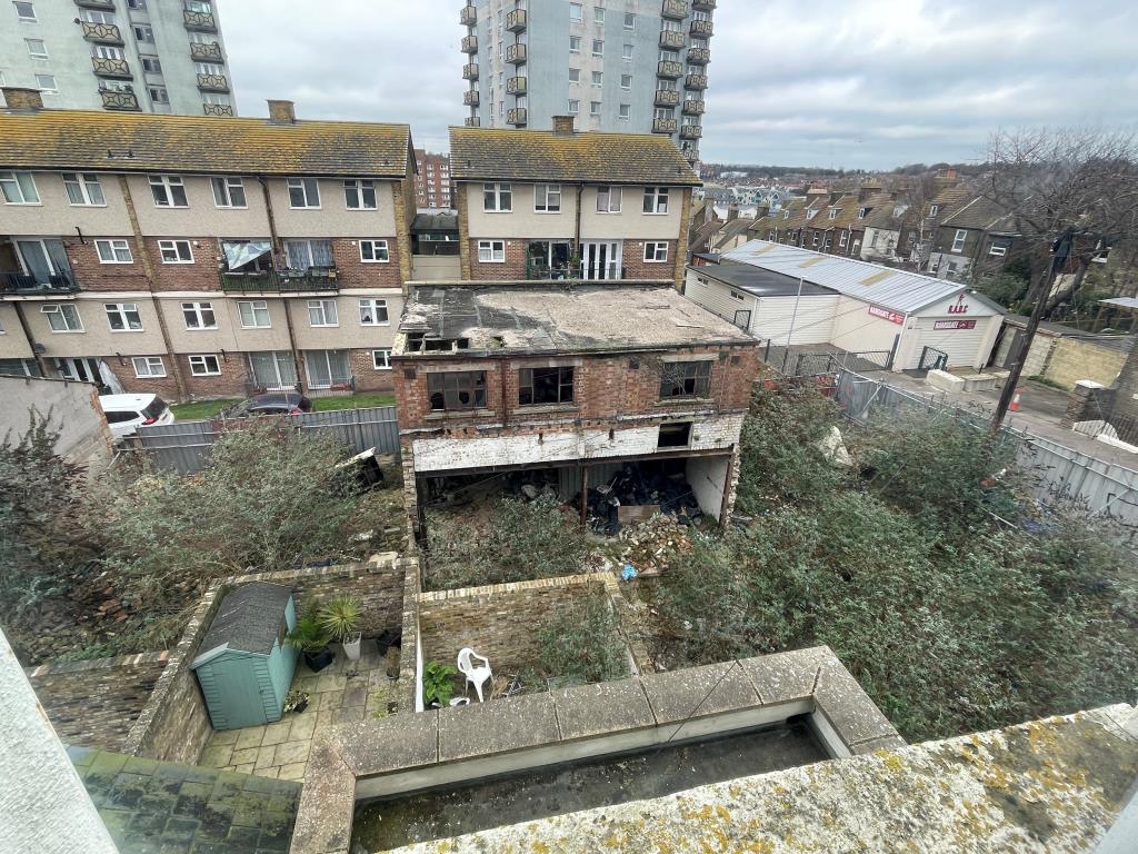 Lot: 72 - SITE WITH PLANNING FOR FIVE HOUSES IN TOWN CENTRE - View of site from above